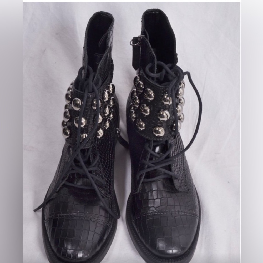 Elegant Black Ankle Boots with Metallic Accents